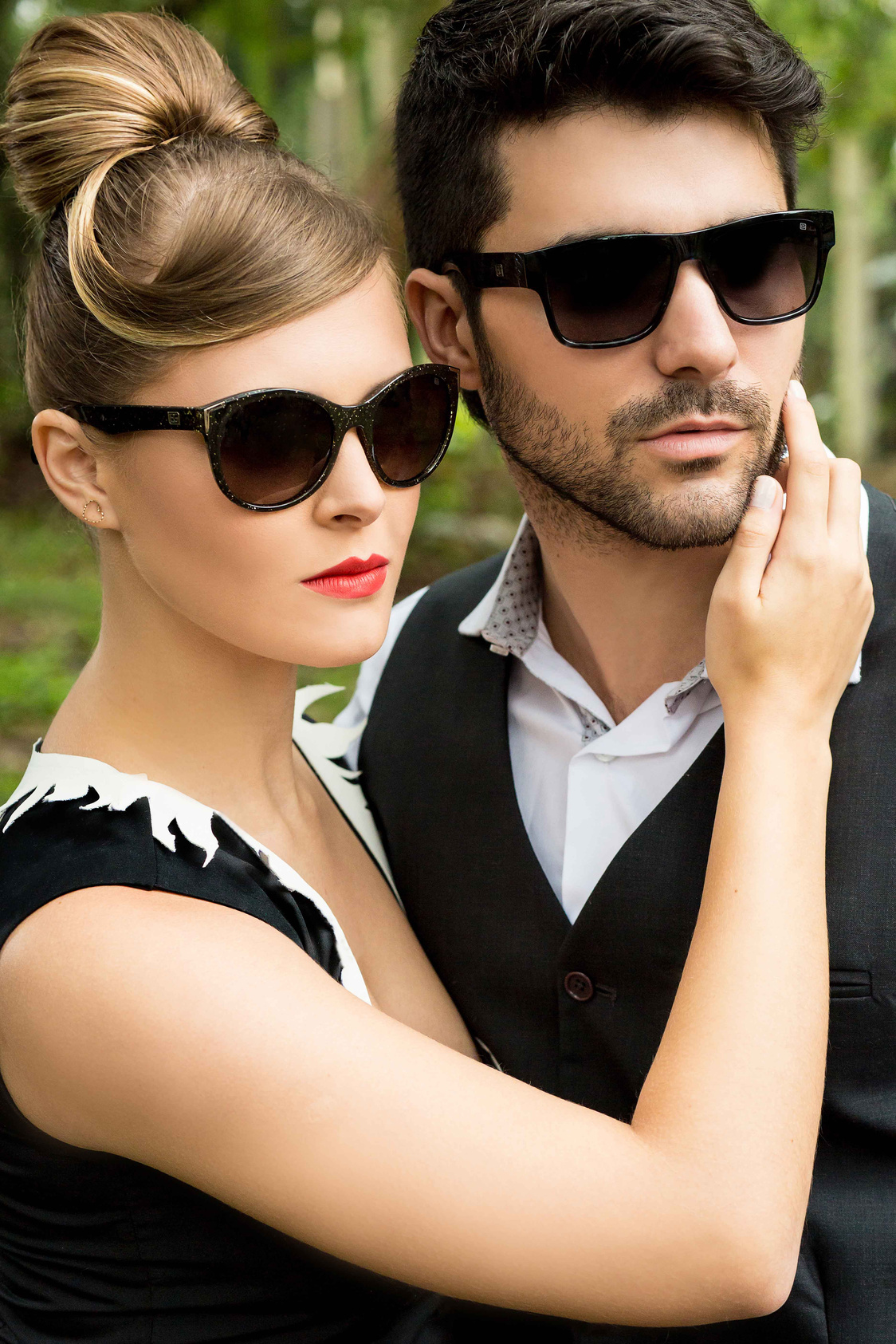 A Couple Wearing Black Sunglasses